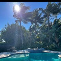 a pretty pool surrounded by foliage