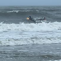 a surfer in waves